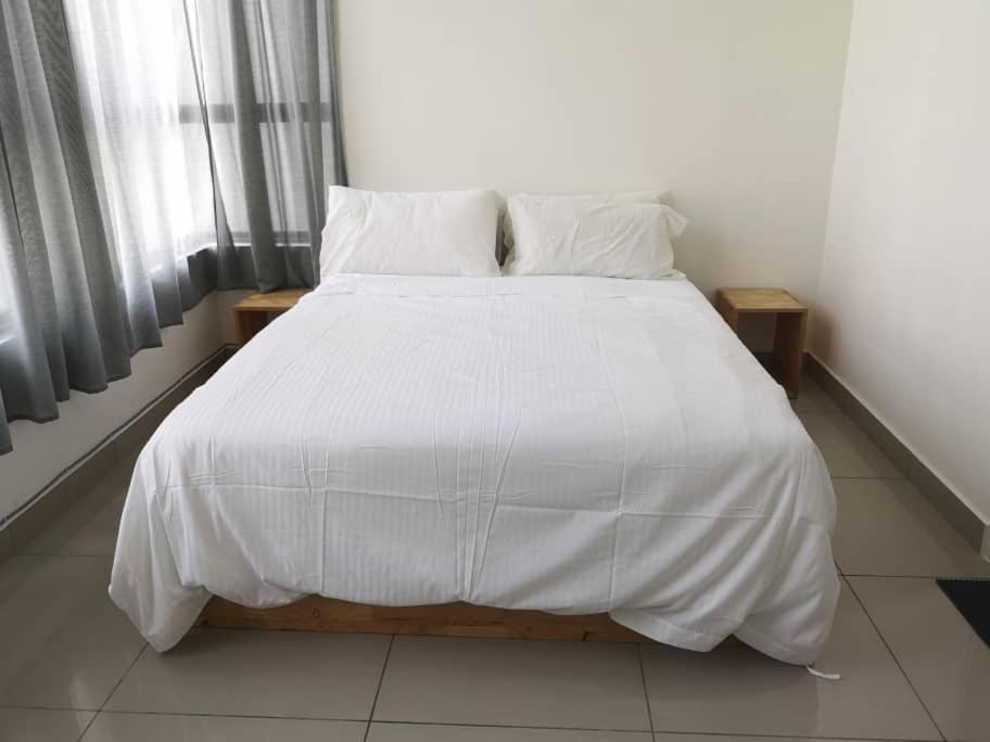 Aiyu Homestay, Conezion, Ioi Resort Putrajaya Exteriör bild